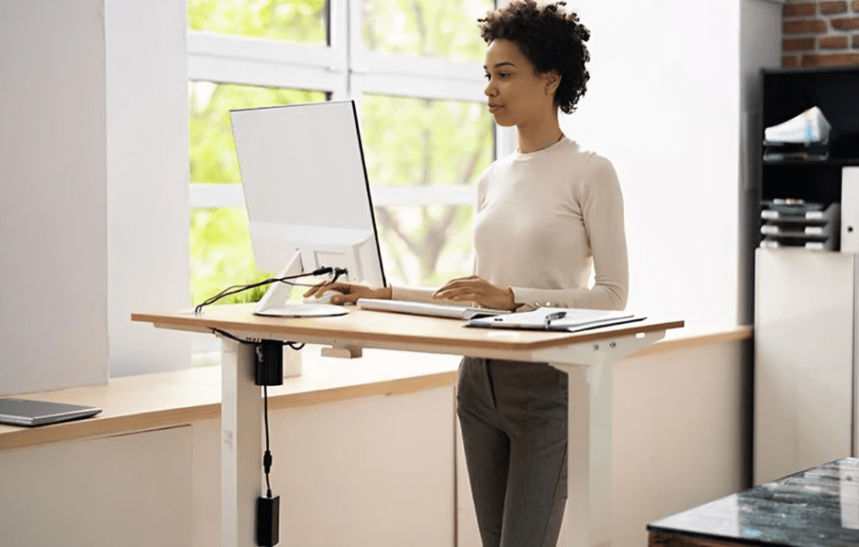 Woman standing in standing desk
